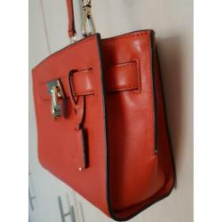 Michael Kors origineel tasje in warme oranje kleur.