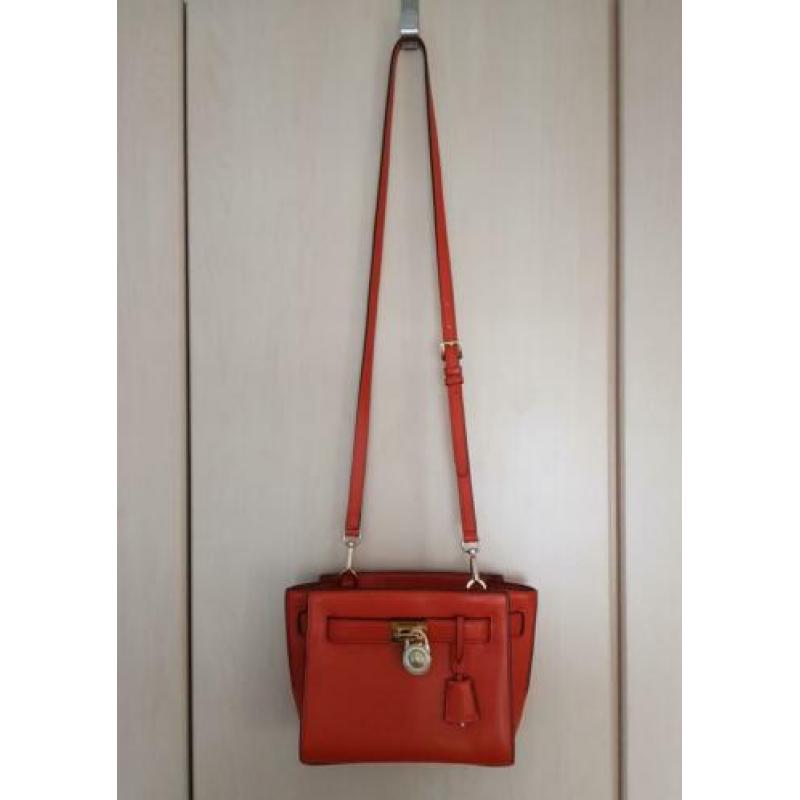 Michael Kors origineel tasje in warme oranje kleur.
