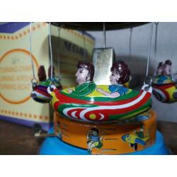 oude vintage blikken speelgoed draaimolen merry go round