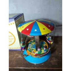 oude vintage blikken speelgoed draaimolen merry go round