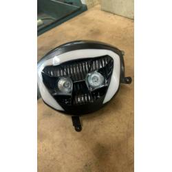 Koplamp voor Piaggio Zip 2000km oud met smoke glas