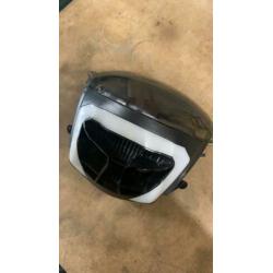 Koplamp voor Piaggio Zip 2000km oud met smoke glas