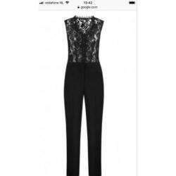 Nieuwe Rumi jumpsuit Nikkie maat 34 kaartjes aan