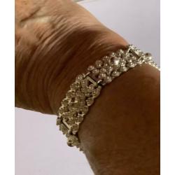 Antieke zilveren(835)ARMBAND bezet met spinnekopjes.Gekeurd