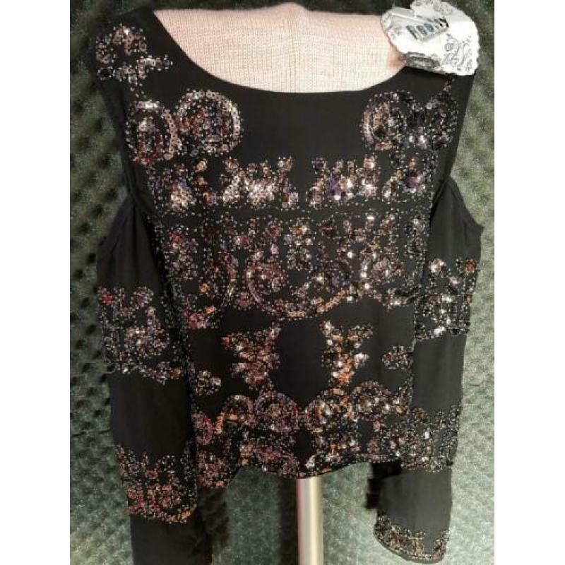 Mooie blouse met pailletten