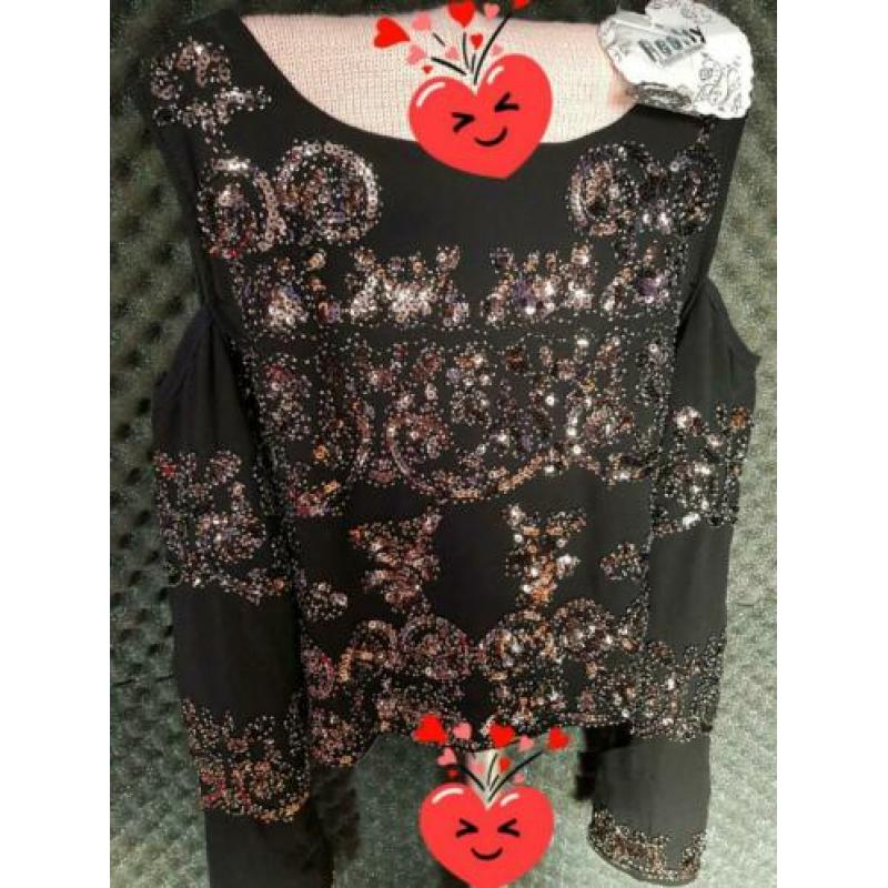 Mooie blouse met pailletten