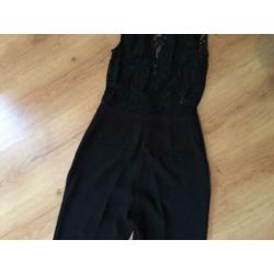 Nieuwe Rumi jumpsuit Nikkie maat 34 kaartjes aan
