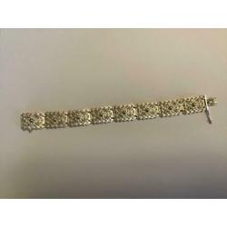 Antieke zilveren(835)ARMBAND bezet met spinnekopjes.Gekeurd
