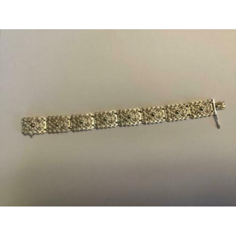 Antieke zilveren(835)ARMBAND bezet met spinnekopjes.Gekeurd