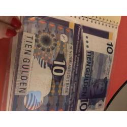 Nederlands geld met briefjes en munten 10 gulden