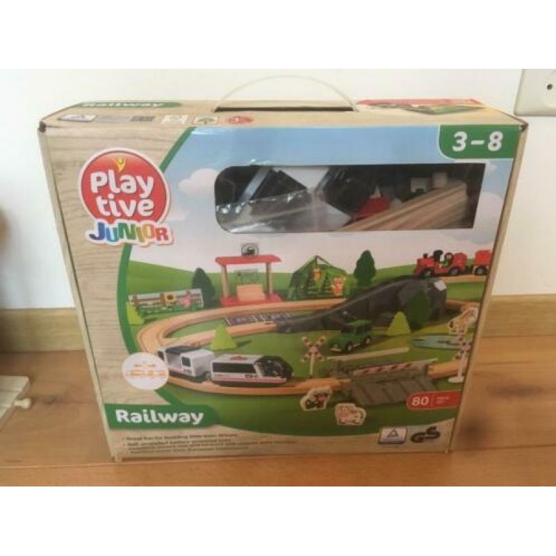 Trainrails met toebehoren en autogarage