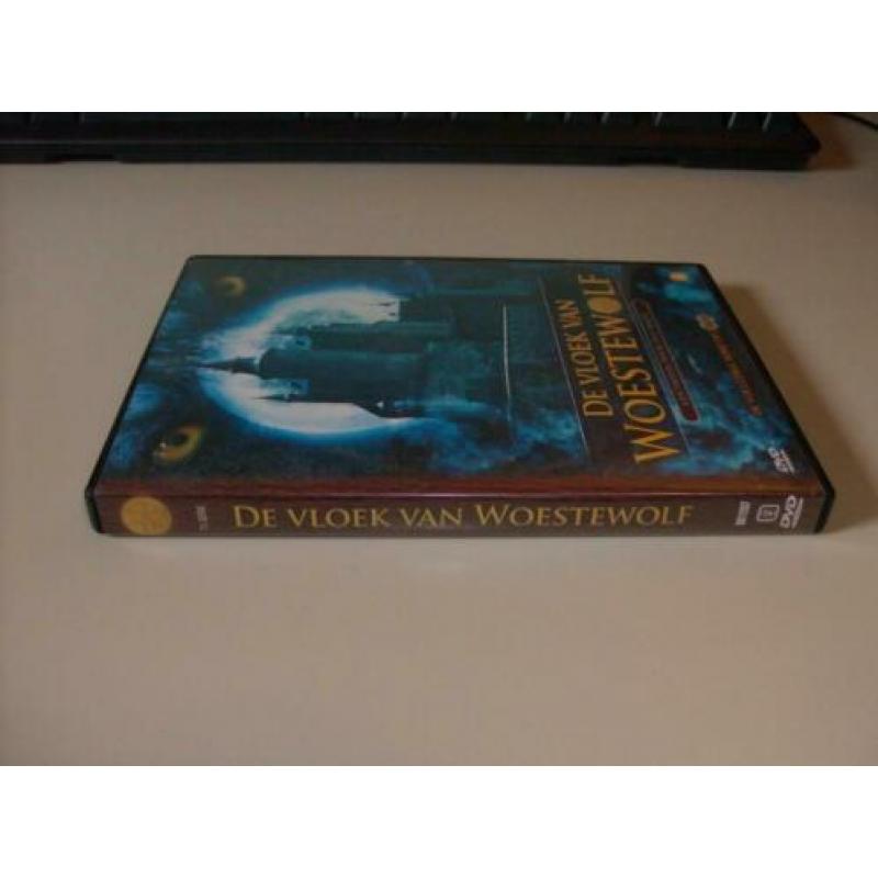 De vloek van Woestewolf - 2 Discs - Paul Biegel