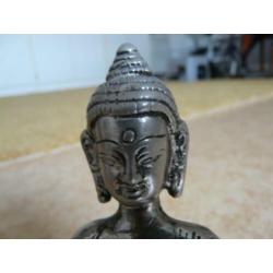 verzilverde Boeddha uit Nepal