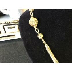 Goudkleurige ketting zie foto’s