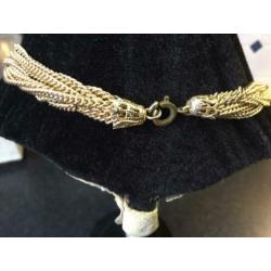 Goudkleurige ketting zie foto’s