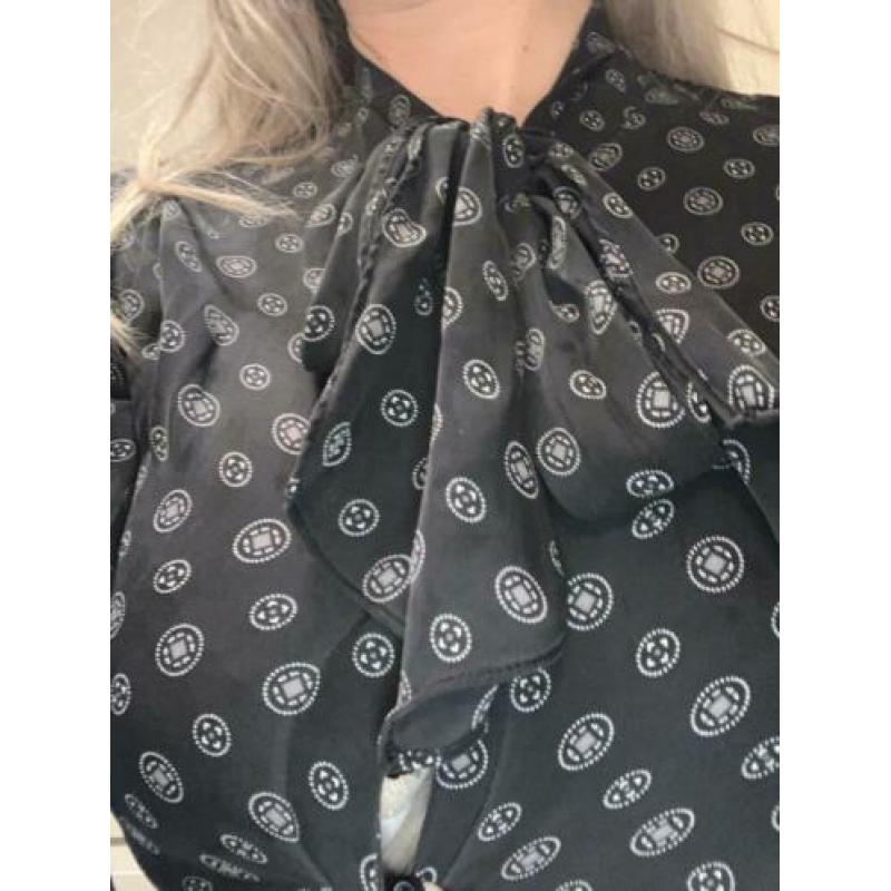 micheal kors bloude met strik voorkamt