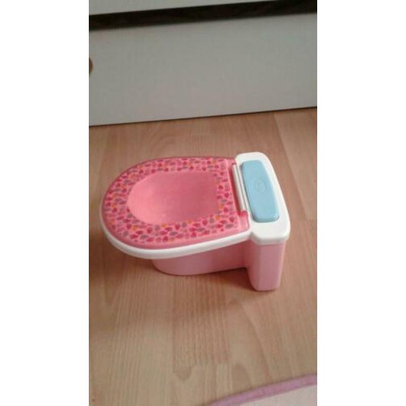 Te koop zgan baby born wc met door trek geluid