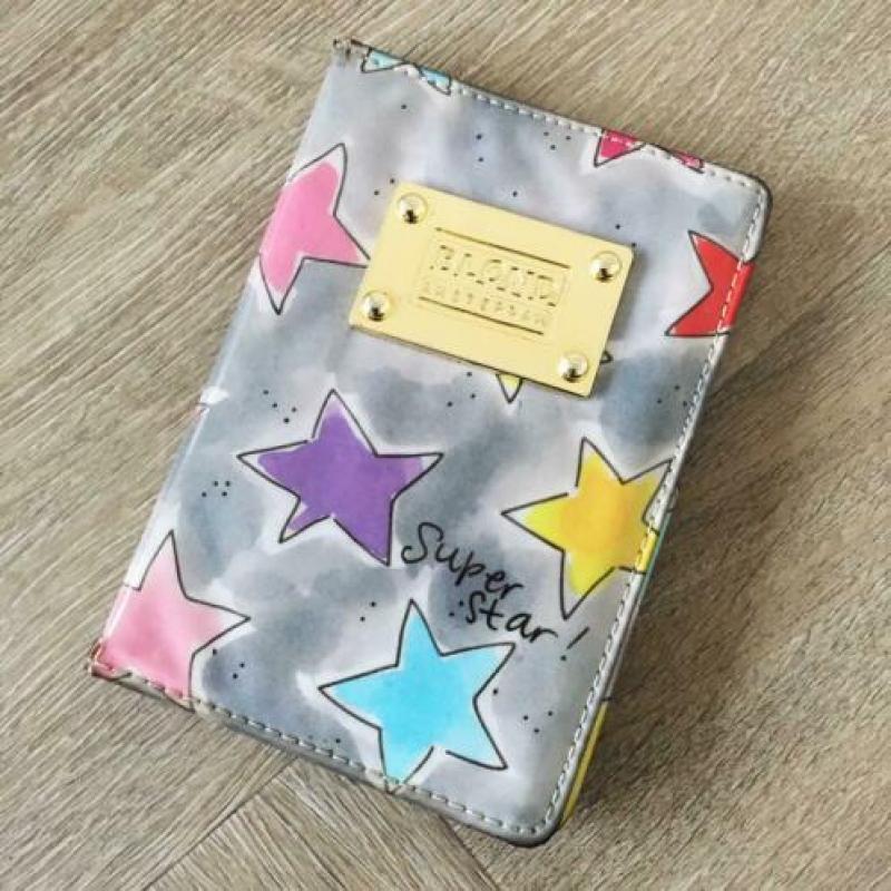 Blond Amsterdam paspoort mapje met sterren