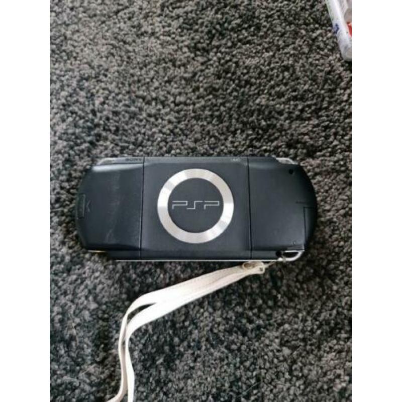 Psp met 16 spellen te koop