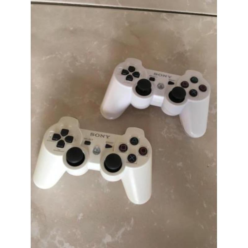 PS3 Slim Wit 320Gb met 2 controllers en 25 spellen