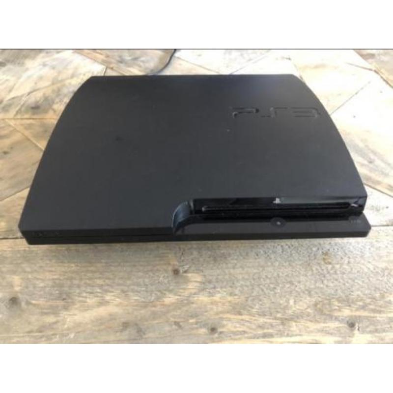 PS3 slim inclusief spellen en controllers
